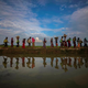 Rohingya refugees walk along an embankment after fleeing from Myanmar into Palang Khali, near Cox’s Bazar, Bangladesh, on Nov. 2, 2017.